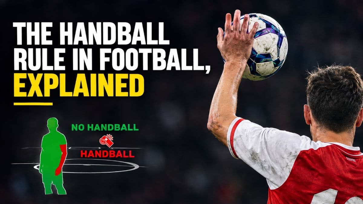 A defender blocking a shot with arms close to his body inside the penalty area