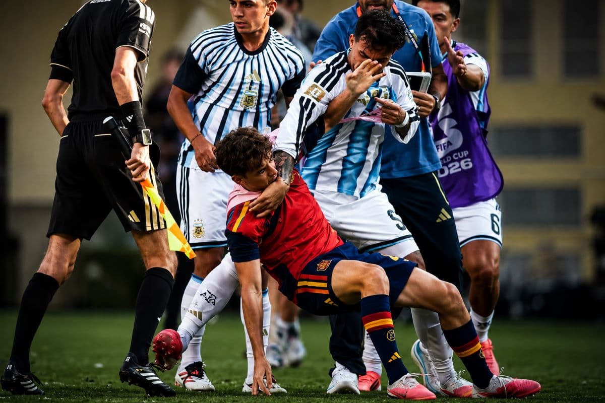 Players confront each other on the pitch after the World Cup final