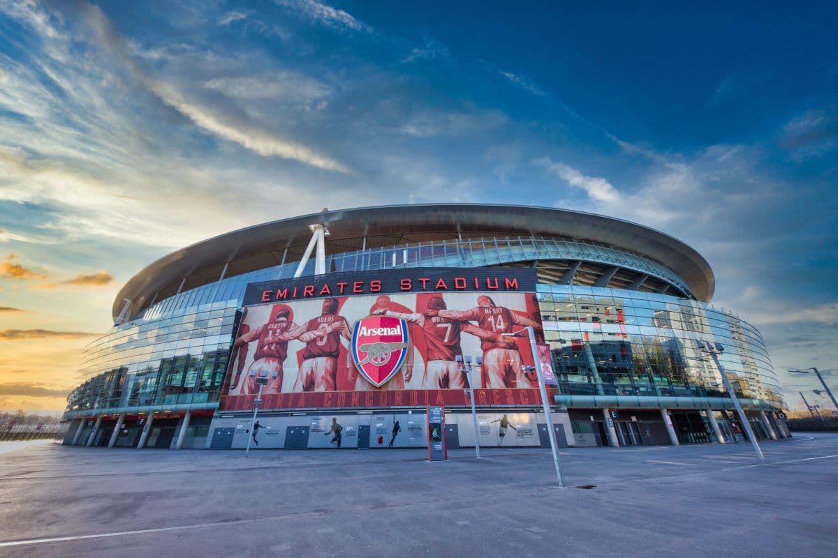 The exterior of Arsenal's Emirates Stadium at sunrise